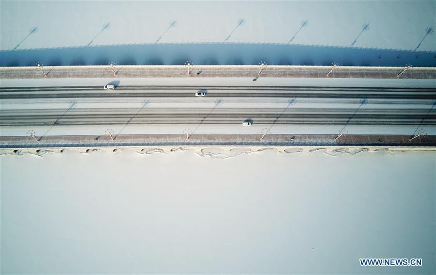 Photo taken on Jan. 31, 2019 shows the snow scenery of Yuehaiwan business district in Yinchuan, capital of northwest China\'s Ningxia Hui Autonomous Region. (Xinhua/Wang Peng)