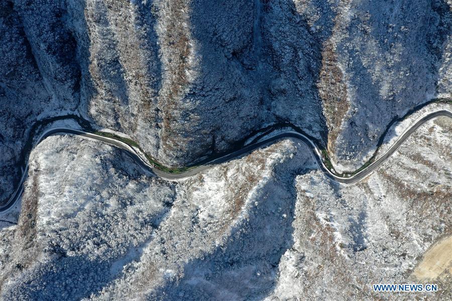 Aerial photo taken on Feb. 1, 2019 shows the snow scenery near Dasanggou Village of Lushi County, central China\'s Henan Province. (Xinhua/Li Jianan)