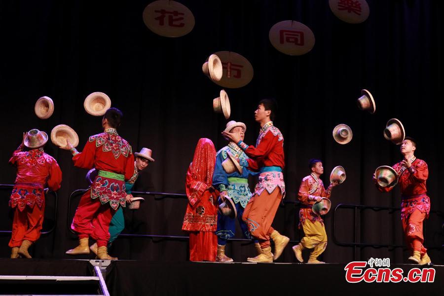 An acrobatic show by performers from the eastern Chinese city Jinan during celebration of the Chinese Lunar Near Year in Auckland, New Zealand, Feb. 2, 2019. Some 20,000 people watched shows including line and dragon dances and other entertainment programs. (Photo: China News Service/Zhang Jianyong)