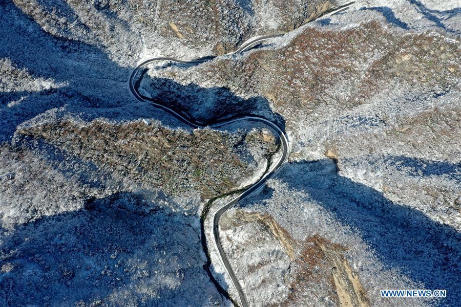 Aerial photo taken on Feb. 1, 2019 shows the snow scenery near Dasanggou Village of Lushi County, central China\'s Henan Province. (Xinhua/Li Jianan)