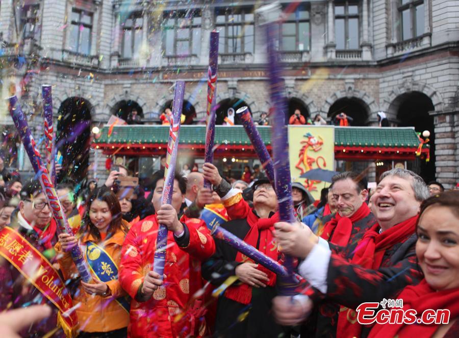 People celebrate the Spring Festival, Chinese Lunar New Year, which falls on Feb. 5 this year, during a parade in Antwerp, the second largest city of Belgium after Brussels, Feb. 2, 2019. (Photo: China News Service/De Yongjian)