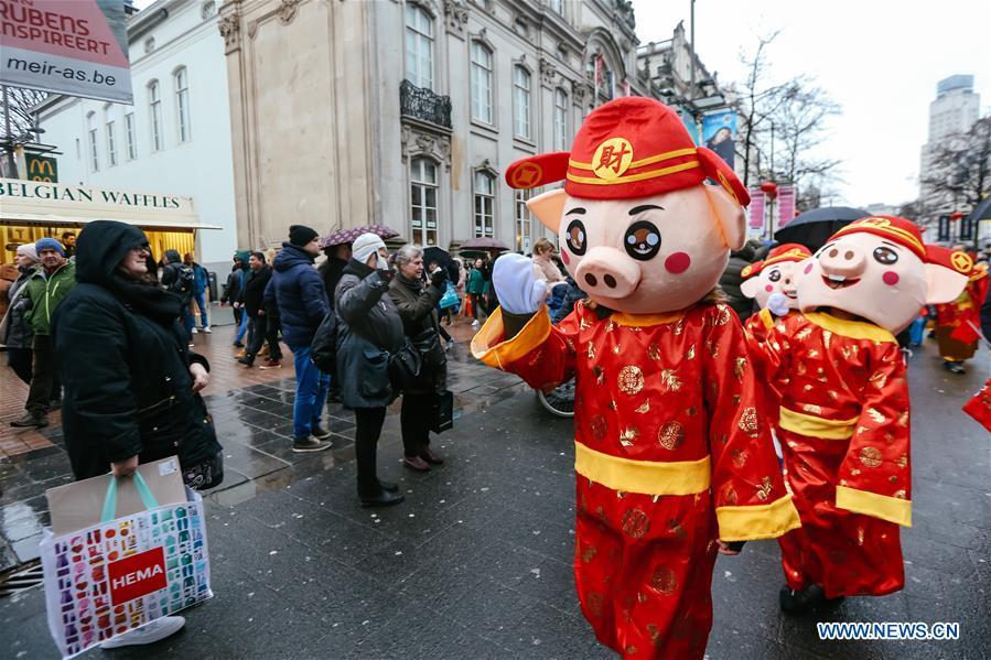 People take part in the 2019 Spring Festival parade in downtown Antwerp, Belgium, on Feb. 2, 2019. A long parade was held in the Belgian city of Antwerp on Saturday as part of the 2019 Spring Festival organized by the local Chinese community and Antwerp to mark the beginning of the Chinese New Year. (Xinhua/Zhang Cheng)