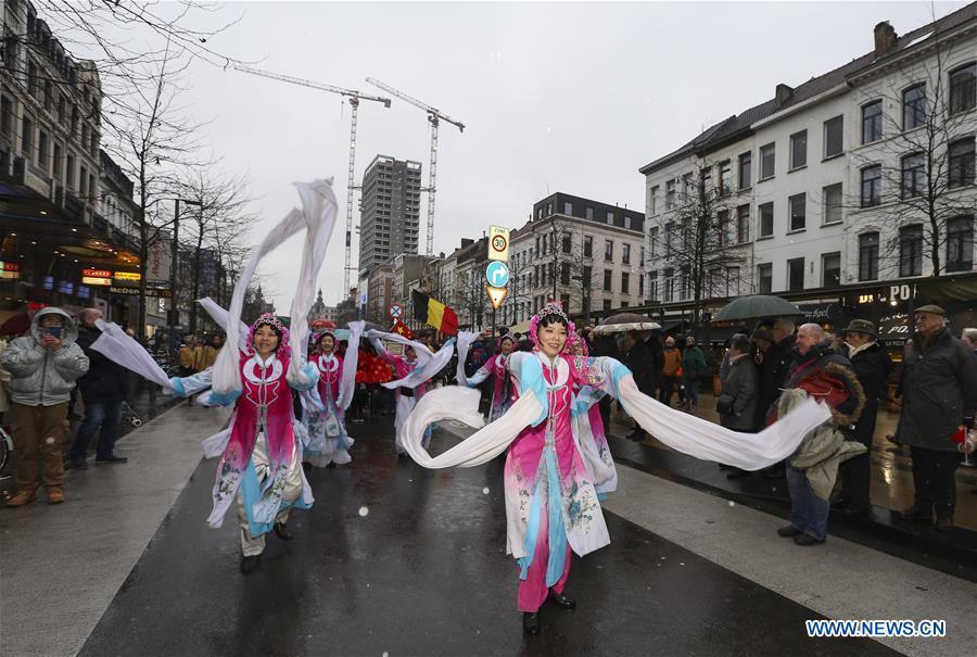 People take part in the 2019 Spring Festival parade in downtown Antwerp, Belgium, on Feb. 2, 2019. A long parade was held in the Belgian city of Antwerp on Saturday as part of the 2019 Spring Festival organized by the local Chinese community and Antwerp to mark the beginning of the Chinese New Year. (Xinhua/Ye Pingfan)