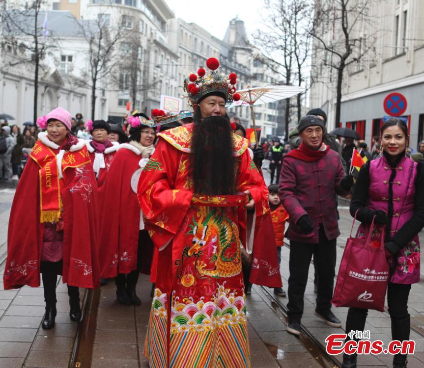 People celebrate the Spring Festival, Chinese Lunar New Year, which falls on Feb. 5 this year, during a parade in Antwerp, the second largest city of Belgium after Brussels, Feb. 2, 2019. (Photo: China News Service/De Yongjian)