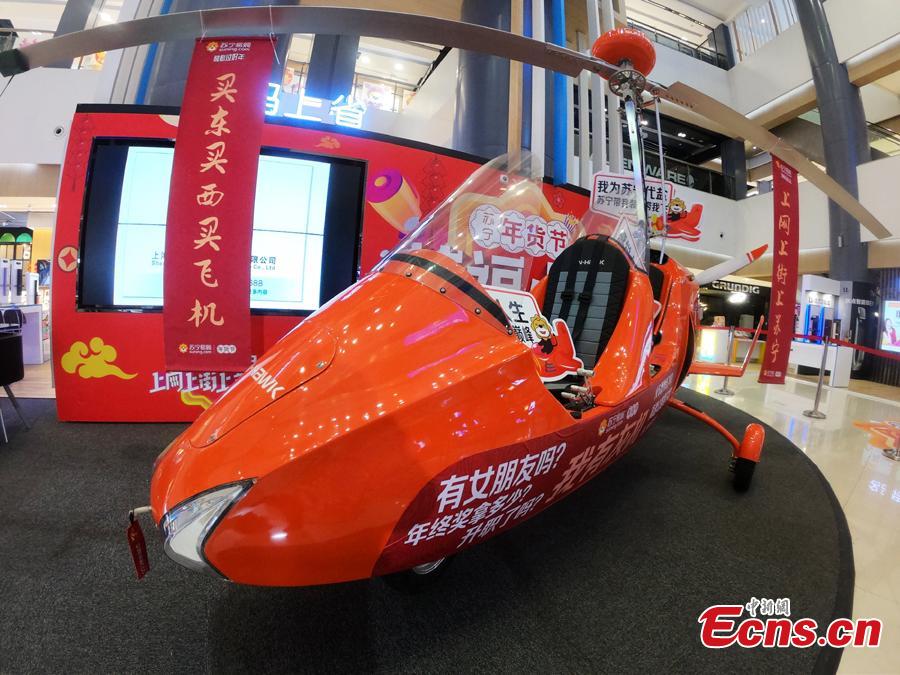 An autogyro, also known as a gyroplane, is on sale at a shopping mall in Shanghai, Feb. 2, 2019, ahead of the Spring Festival. The rotorcraft can fly at a maximum speed of 156 kilometers per hour and has a price tag of 691,800 yuan ($103,000). The mall is promoting it as the most expensive Lunar New Year gift. (Photo: China News Service/Zhang Hengwei)