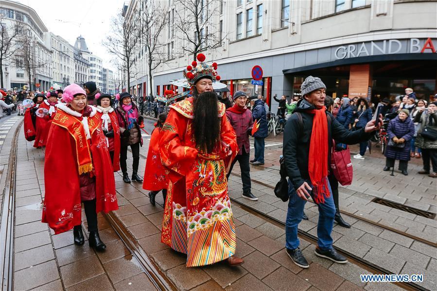 People take part in the 2019 Spring Festival parade in downtown Antwerp, Belgium, on Feb. 2, 2019. A long parade was held in the Belgian city of Antwerp on Saturday as part of the 2019 Spring Festival organized by the local Chinese community and Antwerp to mark the beginning of the Chinese New Year. (Xinhua/Zhang Cheng)