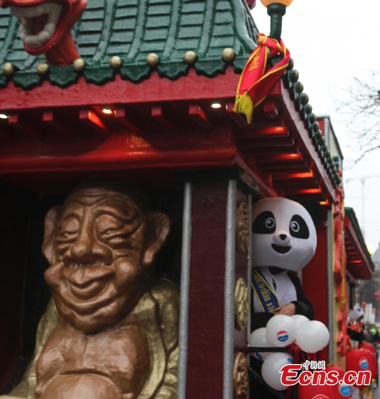 People celebrate the Spring Festival, Chinese Lunar New Year, which falls on Feb. 5 this year, during a parade in Antwerp, the second largest city of Belgium after Brussels, Feb. 2, 2019. (Photo: China News Service/De Yongjian)