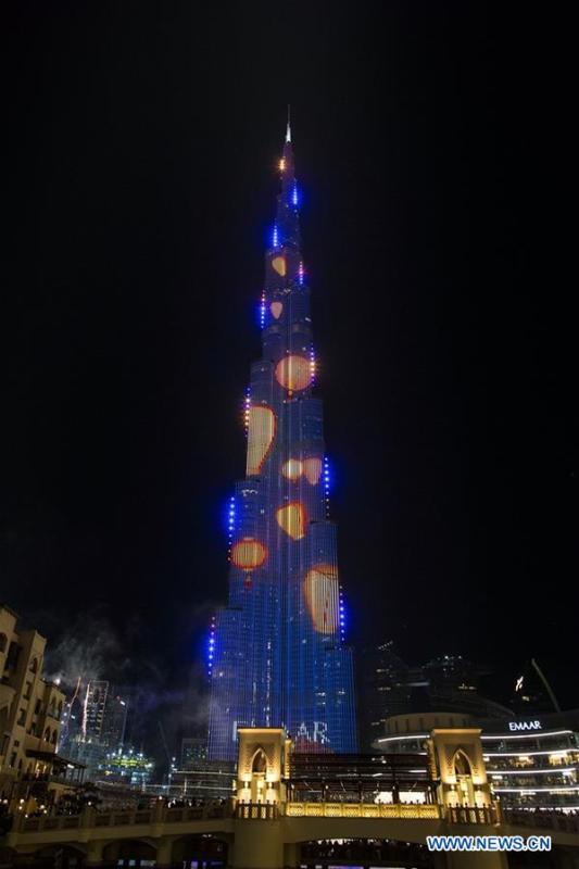 Light show is seen at Burj Khalifa, the world\'s tallest building, to celebrate the Chinese Lunar New Year in Downtown Dubai, the United Arab Emirates (UAE), Feb. 4, 2019. The Chinese Lunar New Year falls on Feb. 5 this year. (Xinhua/Mahmoud Khaled)