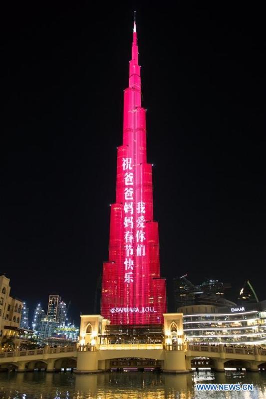 Light show is seen at Burj Khalifa, the world\'s tallest building, to celebrate the Chinese Lunar New Year in Downtown Dubai, the United Arab Emirates (UAE), Feb. 4, 2019. The Chinese Lunar New Year falls on Feb. 5 this year. (Xinhua/Mahmoud Khaled)