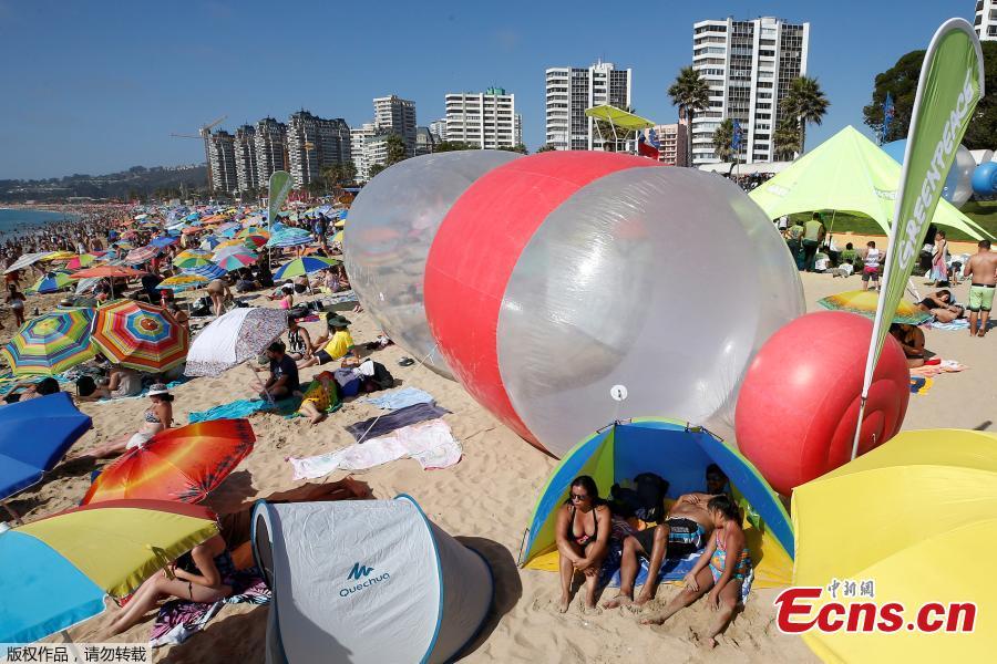 A giant plastic bottle is seen on a beach as part of a campaign by Greenpeace to warn of the presence of plastics on the coasts of Vina del Mar, Chile, Feb. 9, 2019. The campaign aims to end the flow of plastic into the oceans. (Photo/VCG)
