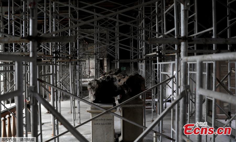 A piece of a meteorite is pictured inside of Brazil National Museum after its devastating fire, in Rio de Janeiro, Brazil, Feb. 12, 2019. Five months after fire gutted Brazil\'s 200-year-old National Museum, the site that once held some of the nation\'s greatest treasures remains a ruin of scorched walls, twisted metal and piles of ash. (Photo/Agencies)