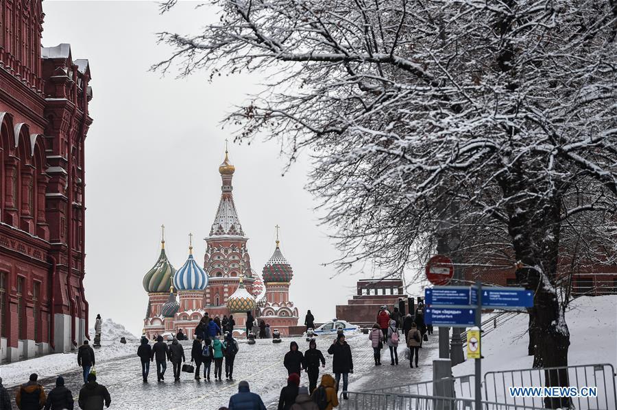 People visit the Red Square after snow in Moscow, Russia, on Feb. 13. 2019. A recent snowfall resulted in 11 mm of precipitation in Moscow on Wednesday. (Xinhua/Evgeny Sinitsyn)