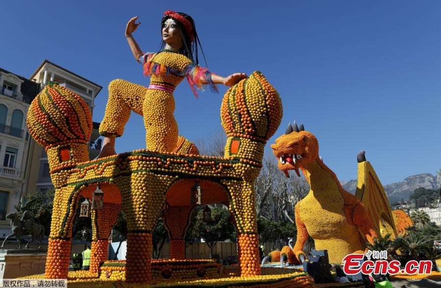A sculpture made with lemons and oranges which depicts Scheherazade is seen during the 86th Lemon festival around the theme \