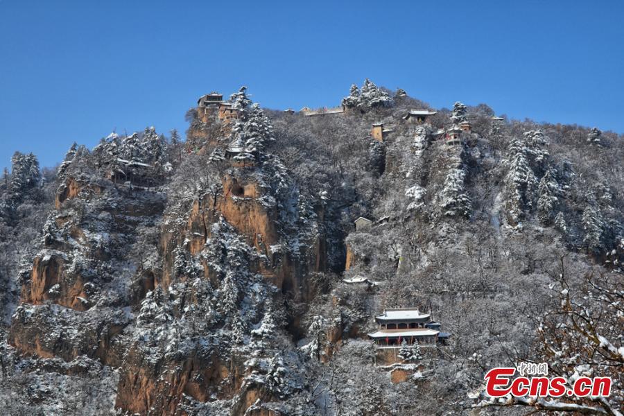 A view of the snow-covered Kongtong Mountain, one of the sacred mountains of Taoism, in Pingliang City, Gansu Province in mid-February. The spot is noted for its marvelous natural scenery and is referred to as \