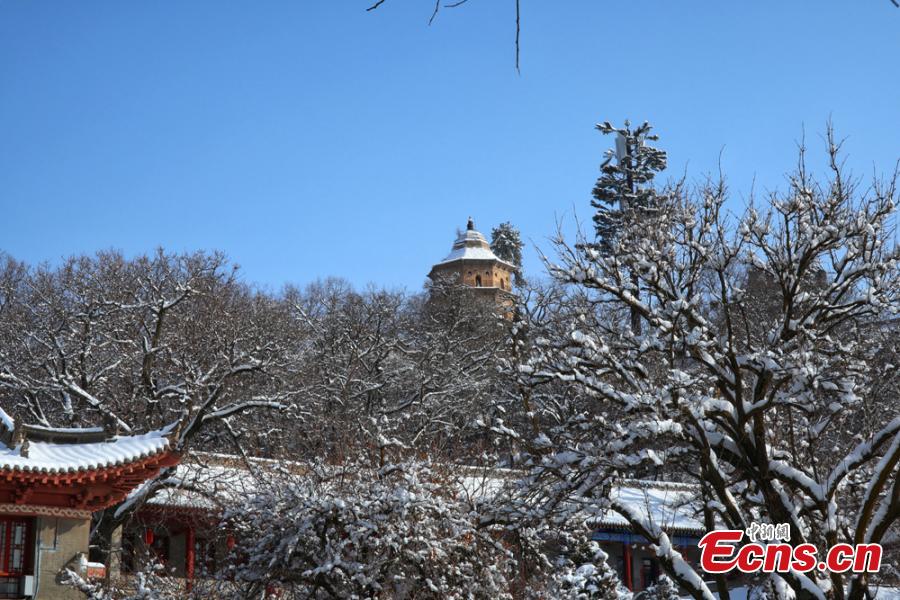 A view of the snow-covered Kongtong Mountain, one of the sacred mountains of Taoism, in Pingliang City, Gansu Province in mid-February. The spot is noted for its marvelous natural scenery and is referred to as \