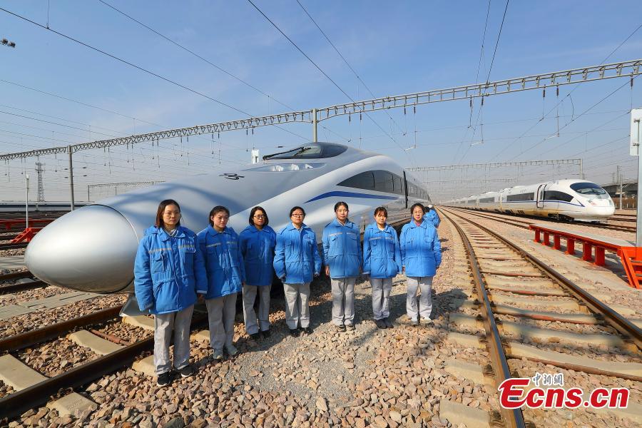Technicians pose after a drill simulating a mechanical failure on a high-speed train in Taiyuan, North China’s Shanxi Province, Feb. 21, 2019. The team at the high-speed train service station in Taiyuan, established on March 8, 2018, is comprised of 19 female technicians with an average age of 23 years, the first its kind in China. They are responsible for emergency responses related to high-speed trains heading to Beijing. (Photo: China News Service/Zhang Yun)