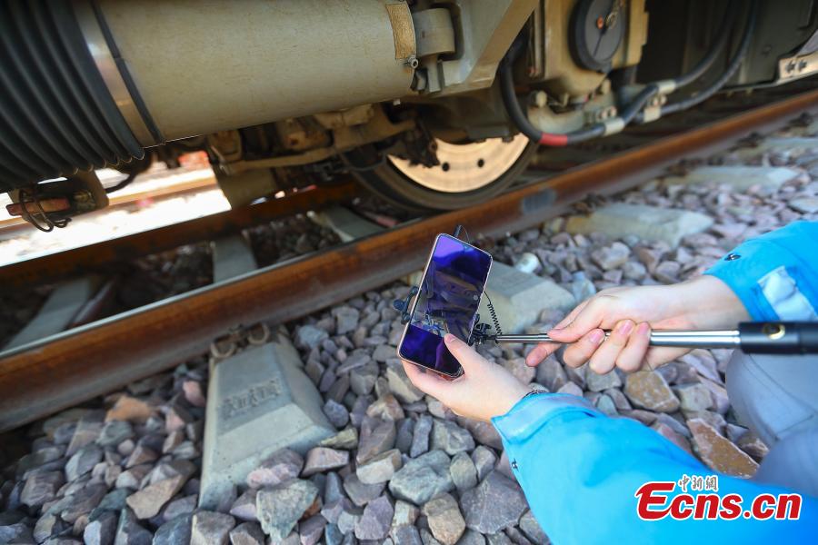 A technician participates in a drill simulating a mechanical failure on a high-speed train in Taiyuan, North China’s Shanxi Province, Feb. 21, 2019. The team at the high-speed train service station in Taiyuan, established on March 8, 2018, is comprised of 19 female technicians with an average age of 23 years, the first its kind in China. They are responsible for emergency responses related to high-speed trains heading to Beijing. (Photo: China News Service/Zhang Yun)