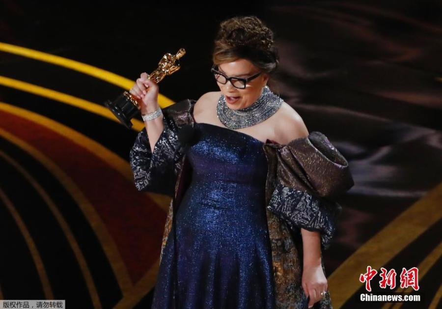 Ruth Carter accepts Costume Design award for \
