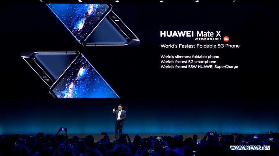 Richard Yu, CEO of Consumer Business Group of Chinese tech company Huawei, presents the new Mate X, a foldable 5G ready smartphone, ahead of the Mobile World Congress in Barcelona, Spain, Feb. 24, 2019. (Xinhua)