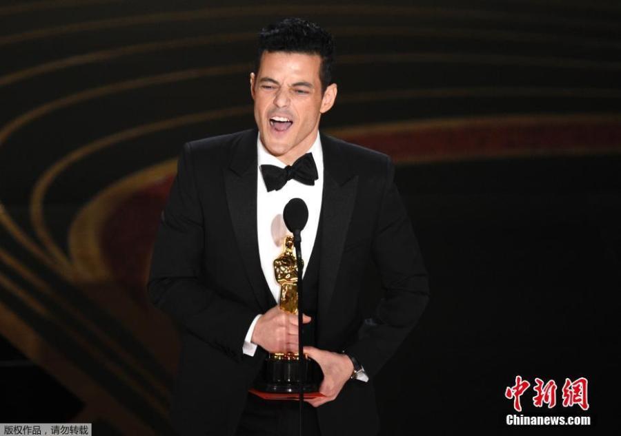 Rami Malek accepts the Best Actor award for his role in \