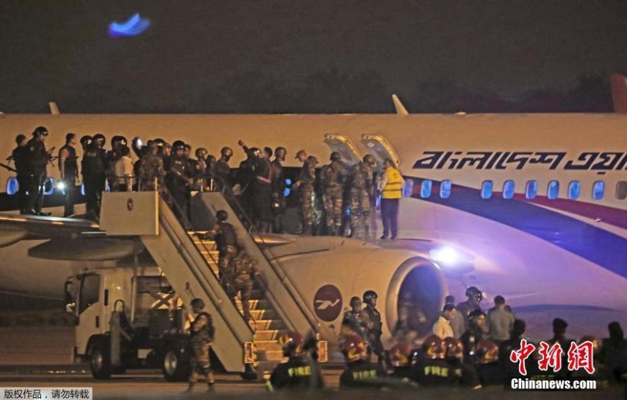 Security personnel check the hijacked aircraft of the Biman Bangladesh Airlines in the Shah Amanat International Airport in Chattogram, Bangladesh, Feb. 24, 2019. (Photo/Agencies)