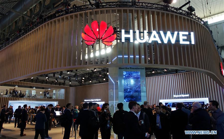 People are seen at the booth of Chinese tech company Huawei at the 2019 Mobile World Congress (MWC) in Barcelona, Spain, Feb. 25, 2019. The four-day 2019 MWC opened on Monday in Barcelona. (Xinhua/Guo Qiuda)