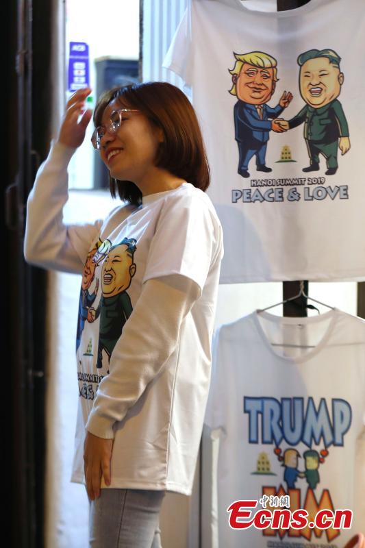 T-shirts emblazoned with depictions of Kim Jong Un, the leader of the Democratic People\'s Republic of Korea, and U.S. President Donald Trump are on display ahead of a summit in Hanoi, Vietnam Feb. 25, 2019. (Photo: China News Service/Fu Tian)