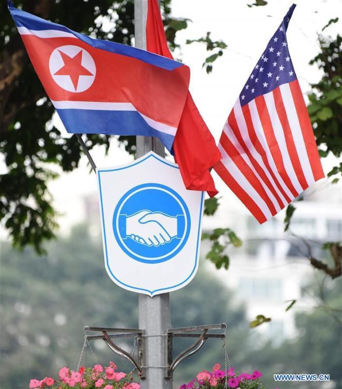 Photo taken on Feb. 25, 2019 shows national flags of Vietnam, the DPRK and the United States in Hanoi, Vietnam. The second summit between top leader of the Democratic People\'s Republic of Korea (DPRK) Kim Jong Un and U.S. President Donald Trump will be held in Hanoi on Feb. 27-28. (Xinhua/Wang Shen)