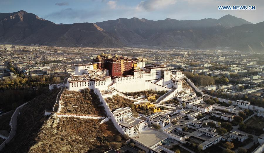 Aerial photo shows the Potala Palace in Lhasa, capital of southwest China\'s Tibet Autonomous Region, Nov. 15, 2018. The Chinese government will invest 300 million yuan (44.9 million U.S. dollars) in the next 10 years in its greatest efforts of protection and utilization of ancient documents in the Potala Palace, a World Heritage site in Lhasa, southwest China\'s Tibet Autonomous Region, according to the management office of the Potala Palace. (Xinhua/Purbu Zhaxi)