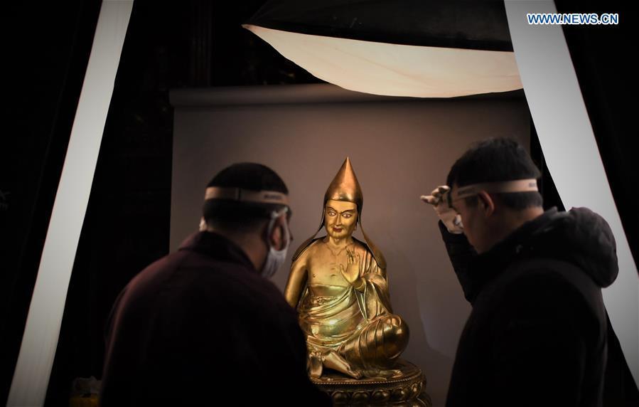 Staff members of the Potala Palace work on registration of documents in Lhasa, capital of southwest China\'s Tibet Autonomous Region, Nov. 16, 2018. The Chinese government will invest 300 million yuan (44.9 million U.S. dollars) in the next 10 years in its greatest efforts of protection and utilization of ancient documents in the Potala Palace, a World Heritage site in Lhasa, southwest China\'s Tibet Autonomous Region, according to the management office of the Potala Palace. (Xinhua/Purbu Zhaxi)