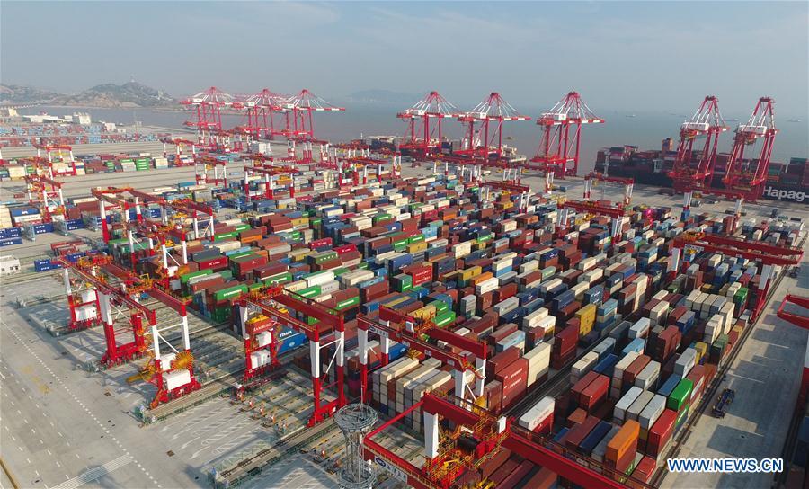 Aerial photo taken on July 25, 2018 shows Phase IV of the Yangshan Deep Water Port of east China\'s Shanghai. China Development Bank (CDB), the world\'s largest development finance institution, has extended trillions of yuan of loans to support the development of the Yangtze River Economic Belt. As of December 2018, outstanding loans to 11 provincial-level regions along the belt amounted to 3.85 trillion yuan (about 575 billion U.S. dollars), according to the CDB. New yuan loans to these regions reached 304.5 billion yuan last year, accounting for 48 percent of the bank\'s total new yuan loans. The funds mainly went to major projects in the fields of ecological protection and restoration, infrastructure connectivity, and industrial transformation and upgrading. The CDB will continue to support ecological protection and green development of the Yangtze River in 2019, said CDB Chairman Zhao Huan. China issued a development plan for the Yangtze River Economic Belt in September 2016 and a guideline for green development of the belt in 2017. The Yangtze River Economic Belt consists of nine provinces and two municipalities that cover roughly one-fifth of China\'s land. It has a population of 600 million and generates more than 40 percent of the country\'s GDP. (Xinhua/Ding Ting)