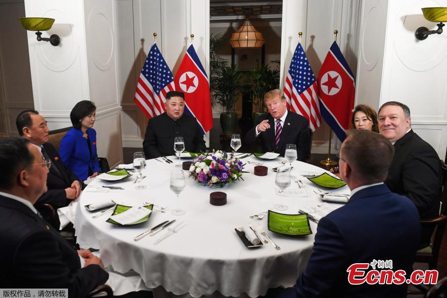 U.S. President Donald Trump and DPRK top leader Kim Jong-un sit down for a dinner during the second U.S.-DPRK summit at the Metropole Hotel in Hanoi, Vietnam February 27, 2019. Also pictured at right are U.S. Secretary of State Mike Pompeo and Acting White House Chief of Staff Mick Mulvaney. (Photo/Agencies)