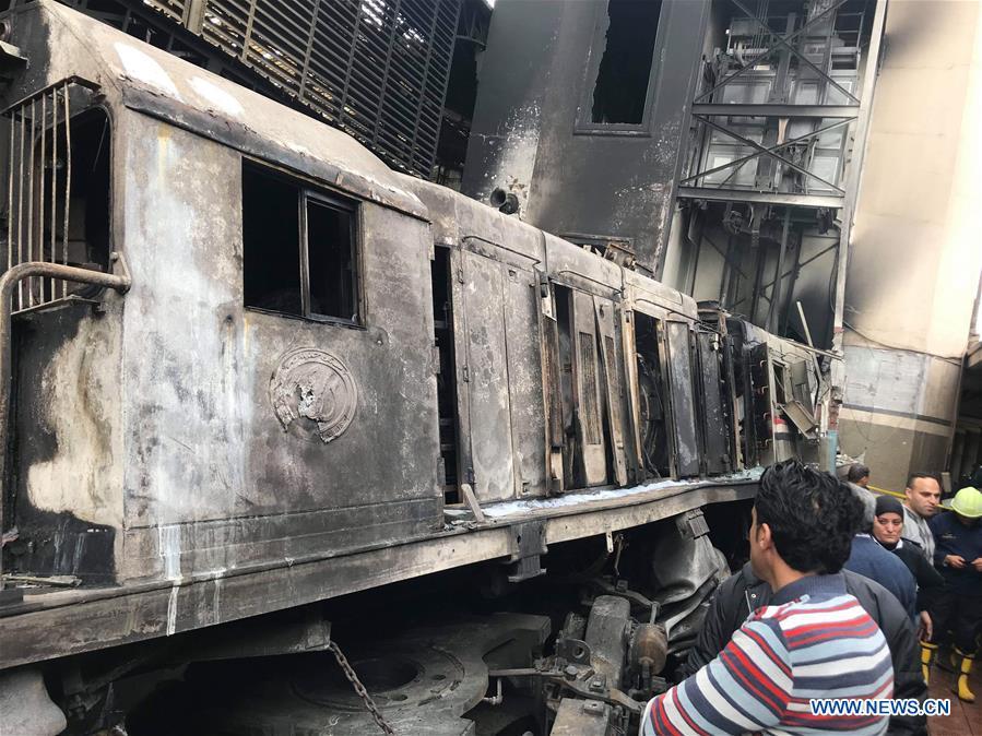 Photo taken on Feb. 27, 2019 shows a fire site at a train station in Cairo, Egypt. At least 25 people were killed and more than 40 others wounded when a fire erupted inside the main train station in the city center of Egypt\'s capital Cairo on Wednesday, state-run Nile TV reported. (Xinhua/Ahmed Gomaa)