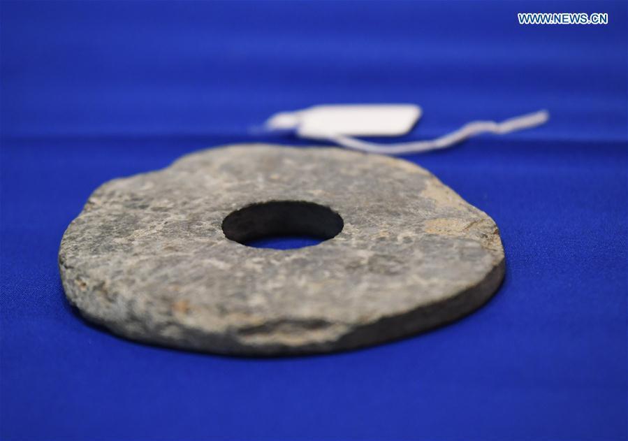 Photo taken on Feb. 28, 2019 shows a jade disc during a repatriation event held in the Eiteljorg Museum of Indianapolis, capital city of state of Indiana, the United States. The United States announced the repatriation of 361 pieces of Chinese relics and artifacts to China at a ceremony on Thursday. (Xinhua/Liu Jie)
