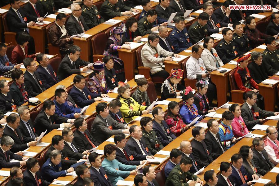 Members of the 13th National Committee of the Chinese People\'s Political Consultative Conference (CPPCC) attend the opening meeting of the second session of the 13th CPPCC National Committee at the Great Hall of the People in Beijing, capital of China, March 3, 2019. (Xinhua/Ding Haitao)