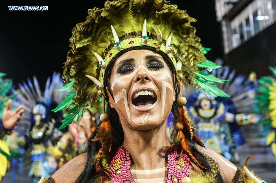 A reveller from a samba school performs during the carnival parade in Sao Paulo, Brazil, March 2, 2019. (Xinhua/Rahel Patrasso)