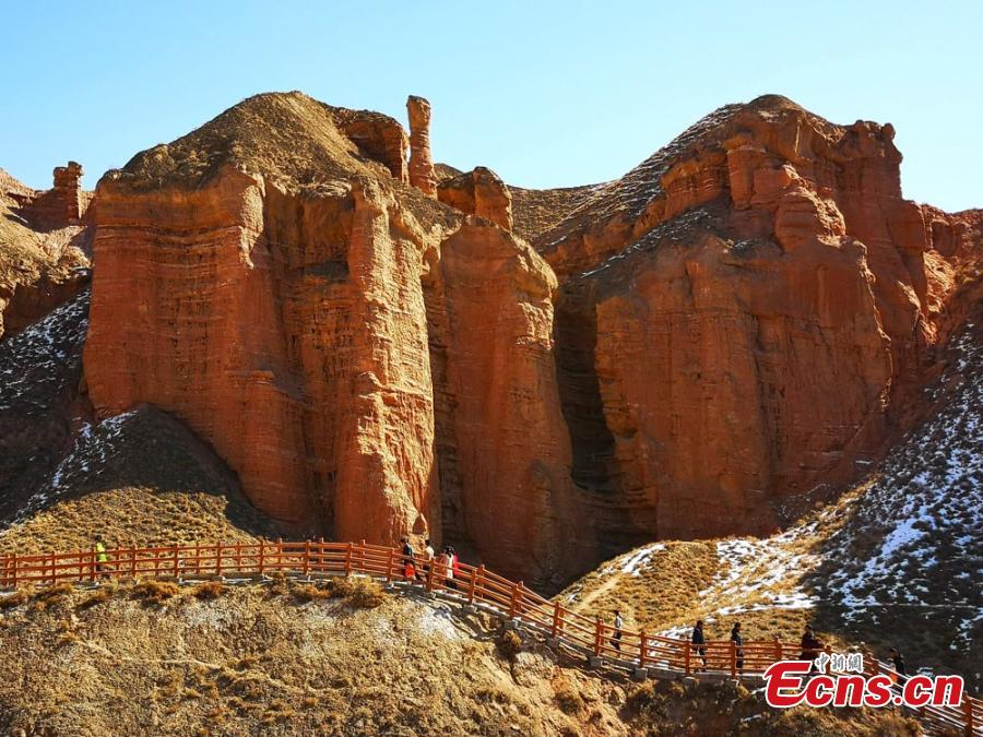 The Binggou Danxia landform in Sunan Yugur Autonomous County, Northwest China\'s Gansu Province. The Danxia landform is a unique type of geomorphology formed from red-colored sandstone and characterized by steep cliffs. The Danxia landform in the Binggou (glacial gully) scenic area is particularly known for its magnificence and strange shapes. (Photo: China News Service/Wu Xuezhen)