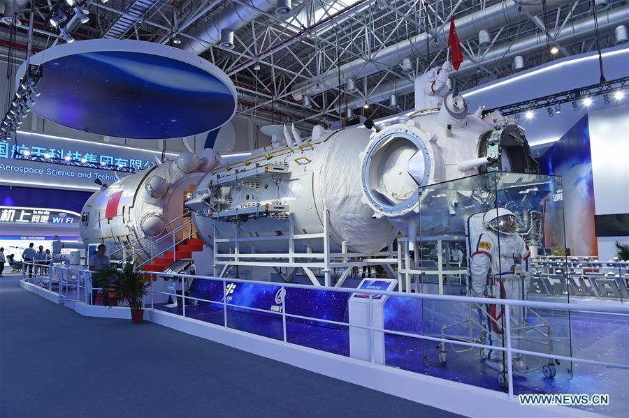 Photo taken on Nov. 5, 2018 shows a full-size model of the core module of China\'s space station Tianhe exhibited at the 12th China International Aviation and Aerospace Exhibition (Airshow China) in Zhuhai, south China\'s Guangdong Province. The China Manned Space Engineering Office (CMSEO) announced Monday that the core module of the country\'s space station, the Long March-5B carrier rocket and its payloads will be sent to the launch site in the second half of this year, to make preparations for the space station missions. China is scheduled to complete the construction of the space station around 2022. It will be the country\'s space lab in long-term stable in-orbit operation. (Xinhua/Liang Xu)