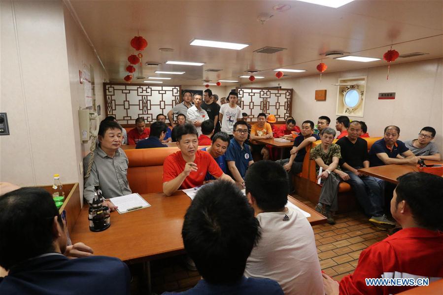 Photo taken on March 1, 2019 shows crew members holding a meeting aboard China\'s research icebreaker Xuelong. Xuelong, carrying members of China\'s 35th research mission to Antarctica, crossed the equator and returned to the Northern Hemisphere on early Monday morning. (Xinhua/Liu Shiping)