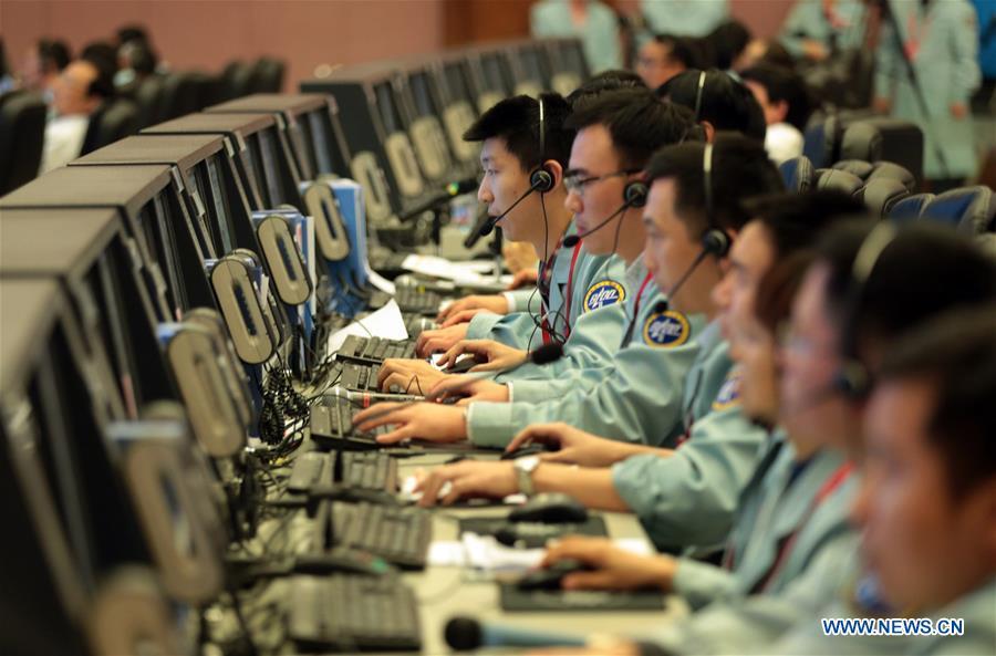 Technicians work at the Beijing Aerospace Control Center (BACC) in Beijing, capital of China, Nov. 18, 2016. The China Manned Space Engineering Office (CMSEO) announced Monday that the core module of the country\'s space station, the Long March-5B carrier rocket and its payloads will be sent to the launch site in the second half of this year, to make preparations for the space station missions. China is scheduled to complete the construction of the space station around 2022. It will be the country\'s space lab in long-term stable in-orbit operation. (Xinhua/Cai Yang)