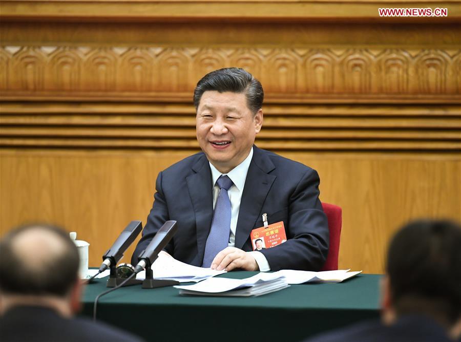 Chinese President Xi Jinping, also general secretary of the Communist Party of China (CPC) Central Committee and chairman of the Central Military Commission, attends a panel discussion with his fellow deputies from Inner Mongolia Autonomous Region at the second session of the 13th National People\'s Congress in Beijing, capital of China, March 5, 2019. (Xinhua/Xie Huanchi)