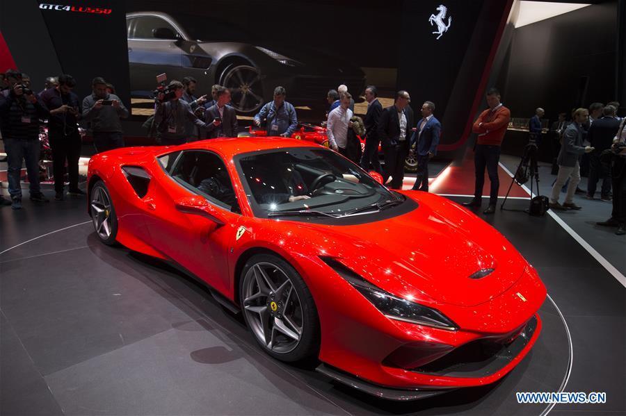 A new Ferrari F8 Tributo is seen on the first press day of the 89th Geneva International Motor Show in Geneva, Switzerland, March 5, 2019. Featuring about 220 world exhibitors, the 89th Geneva International Motor Show will be opened to the public from March 7 to 17. (Xinhua/Xu Jinquan)