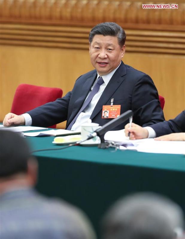 Chinese President Xi Jinping, also general secretary of the Communist Party of China (CPC) Central Committee and chairman of the Central Military Commission, attends a panel discussion with his fellow deputies from Inner Mongolia Autonomous Region at the second session of the 13th National People\'s Congress in Beijing, capital of China, March 5, 2019. (Xinhua/Huang Jingwen)