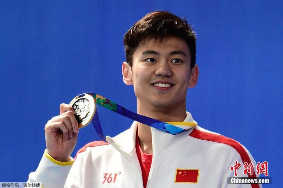 Gold medal winner Ning Zetao of China celebrates after the Men\'s 100m Freestyle final during the FINA Swimming World Championships at Kazan arena in Kazan, Russia, August 6, 2015. (Photo/China News Service)

China\'s world champion swimmer Ning Zetao announced his retirement at the age of 26 on Wednesday.

Ning, one of the country\'s top free style swimmers together with multi world and Olympic champion Sun Yang, fell out of favor after underperforming at the 2016 Rio Olympics and pulled out of many world and domestic events due to medical treatment and commercial reasons.

Ning came into limelight in the Asian Games in Incheon, South Korea, in 2014. He was first to hit the wall at 21.95 in the men\'s 50m freestyle, winning China\'s first gold in men\'s swimming. He won four gold medals at the Asian Games.