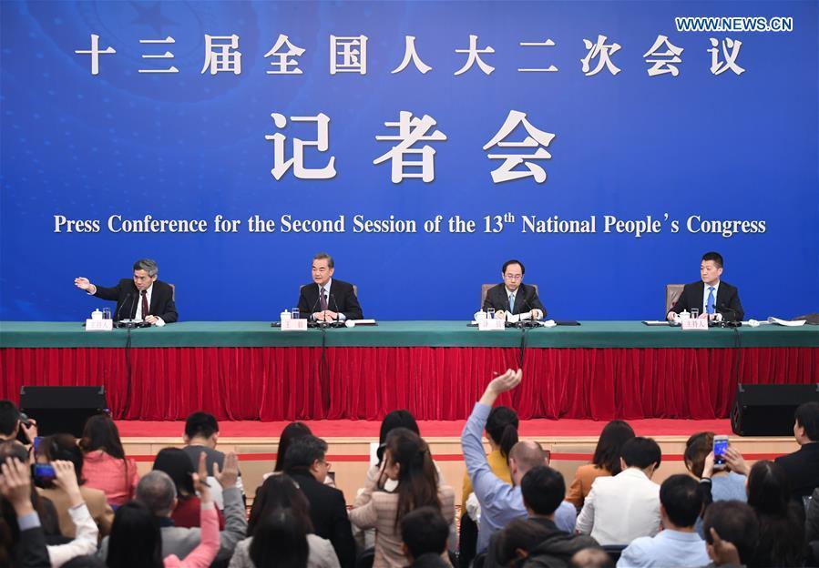 Chinese State Councilor and Foreign Minister Wang Yi(2nd L) attends a press conference on China\'s foreign policy and relations on the sidelines of the second session of the 13th National People\'s Congress in Beijing, capital of China, March 8, 2019. (Xinhua/Chen Yehua)