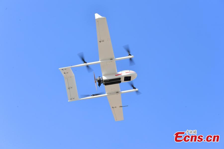 A drone put into use by Chengguan, urban management officers, in Shijiazhuang City, Hebei Province, March 7, 2019. The drone, with a wingspan of four meters, is used to take aerial photos of an area 138 square kilometres in size, to aid Chengguan in spotting open-air garbage and unapproved construction. (Photo: China News Service/Zhai Yujia)