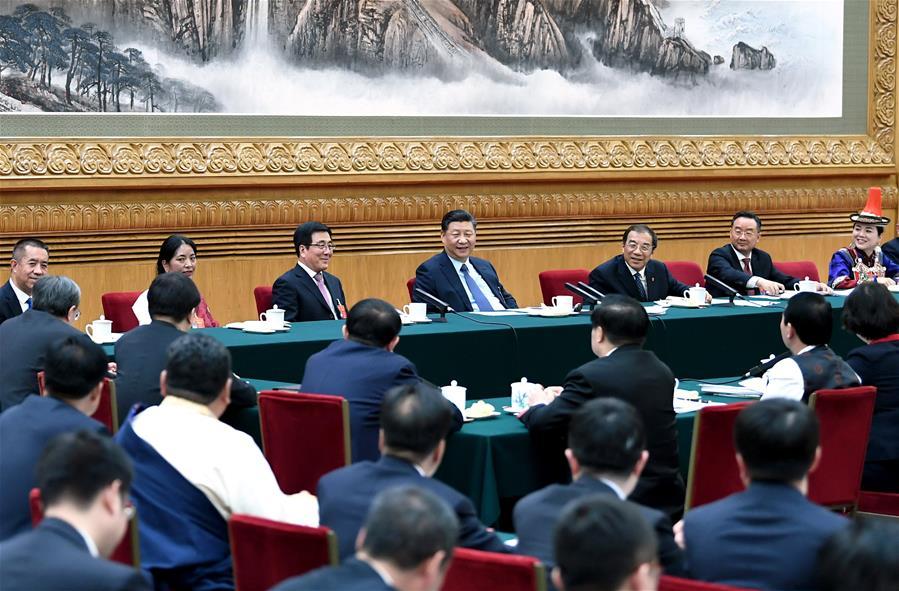 Chinese President Xi Jinping, also general secretary of the Communist Party of China (CPC) Central Committee and chairman of the Central Military Commission, joins deliberation with deputies from Gansu Province at the second session of the 13th National People\'s Congress in Beijing, capital of China, March 7, 2019. (Xinhua/Xie Huanchi)