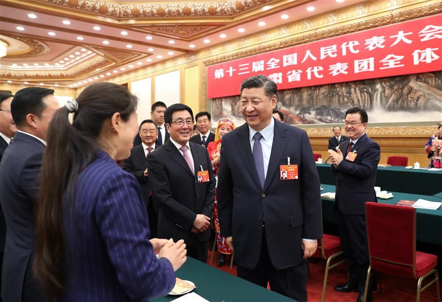 Chinese President Xi Jinping, also general secretary of the Communist Party of China (CPC) Central Committee and chairman of the Central Military Commission, joins deliberation with deputies from Gansu Province at the second session of the 13th National People\'s Congress in Beijing, capital of China, March 7, 2019. (Xinhua/Wang Ye)
