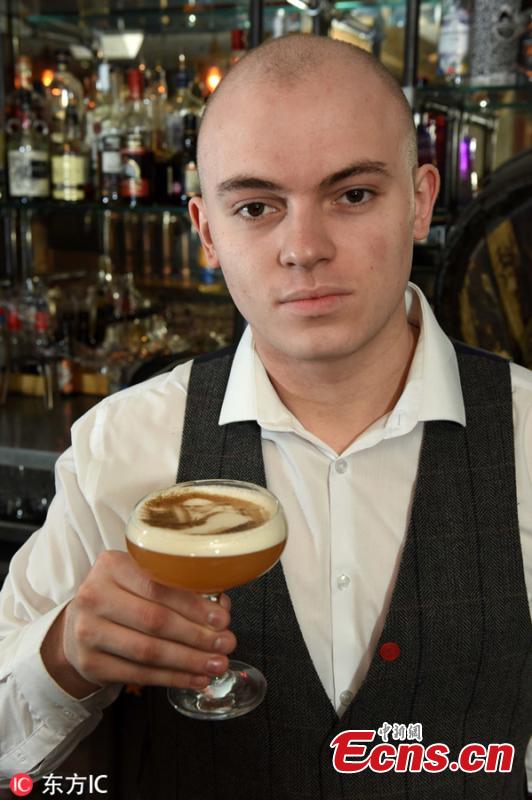 Matt Arnold, senior bar tender at the Canal House bar in Birmingham, with a porn star martini with his face printed on it. Bartenders at The Canal House in Birmingham city centre use a 3D printer to superimpose any image onto the foam atop an espresso, coffee or even a pint of Guinness. Staff said mainly selfies are chosen to adorn the boozy treat - which costs 8.95 - although they have had some more unusual requests.(Photo/Agencies)