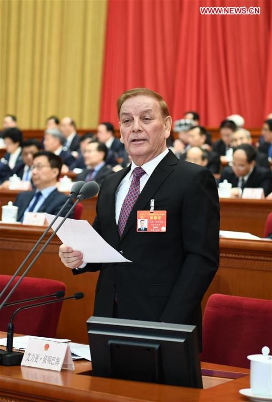 Arken Imirbaki presides over the third plenary meeting of the second session of the 13th National People\'s Congress (NPC) at the Great Hall of the People in Beijing, capital of China, March 12, 2019. (Xinhua/Xie Huanchi)